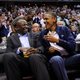 President Barack Obama shares a laugh with former White House aide Reggie Love as they watch the U.S. Senior Men’s National Team and Brazil play during a pre-Olympic exhibition basketball game at the Verizon Center on July 16, 2012, in Washington, D.C.
Leslie E. Kossoff-Pool/Getty Images